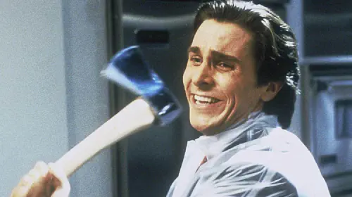 assets/christian-bale-swings-an-axe-in-american-psycho.jpeg