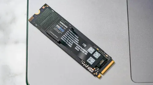 assets/Samsung-990-EVO-SSD-sitting-on-a-laptop.jpeg