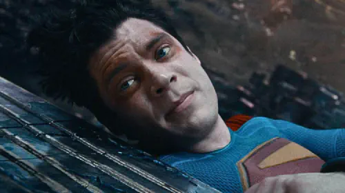 assets/david-corenswet-lying-down-in-superman.jpeg