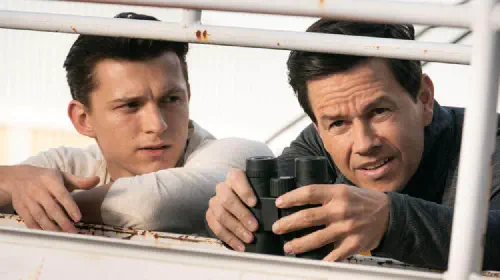 assets/tom-holland-as-nathan-drake-and-mark-wahlberg-in-uncharted.jpeg