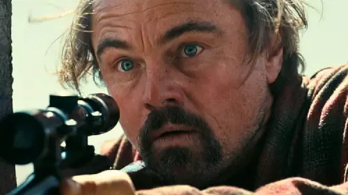 assets/leonardo-dicaprio-holding-rife-in-one-battler-after-another.jpeg