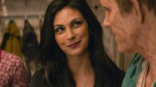 assets/vanessa-smiles-at-wade-in-the-film-deadpool-wolverine.jpeg