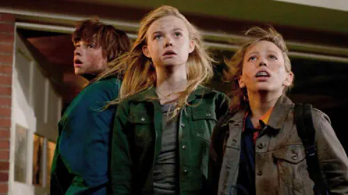 assets/three-kids-look-frightened-in-the-film-super-8.jpeg