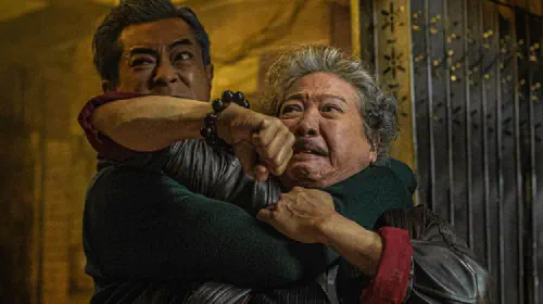 assets/sammo-kam-bo-hung-and-louis-koo-in-twilight-of-the-warriors-walled-in-2024.jpeg