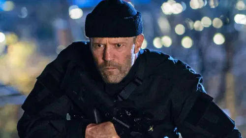 assets/jason-statham-with-rifle-in-operation-fortune.jpeg