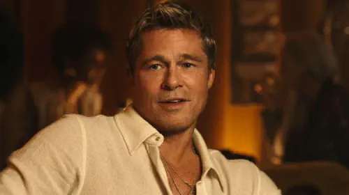 assets/brad-pitt-at-table-in-f1.jpeg