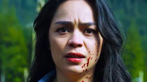 assets/a-girl-looks-frightened-in-final-destination-bloodlines.jpeg