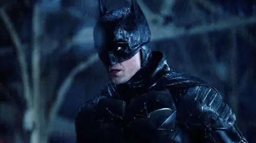 assets/robert-pattinson-as-batman-in-the-rain-in-the-batman.jpeg