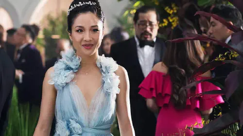 assets/a-woman-in-a-blue-dress-in-crazy-rich-asians.jpeg