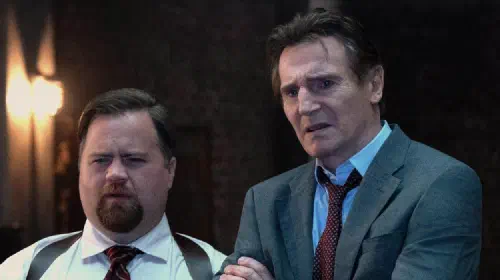 assets/liam-neeson-and-paul-walter-hauser-in-the-naked-gun-2025.jpeg