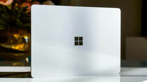 assets/Windows-logo-on-white-laptop-being-stood-on-its-side.jpeg