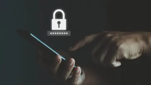 assets/Man-holding-phone-with-password-security-lock-icon-3.jpeg