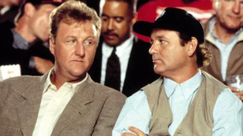 assets/bill-murray-and-larry-bird-in-space-jam-divisive-90s-cult-classic.jpeg