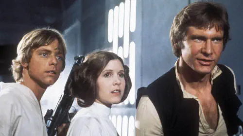 assets/mark-hamill-carrie-fisher-and-harrison-ford-in-star-wars-a-new-hope.jpeg
