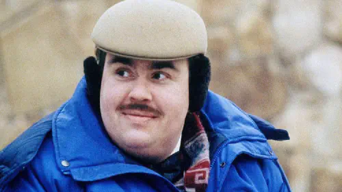 assets/john-candy-in-planes-trains-and-automobiles.jpeg