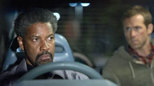 assets/denzel-washington-and-ryan-reynolds-in-safe-house.jpeg