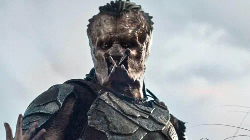 assets/dimitrius-schuster-koloamatangi-as-dek-in-predator-badlands.jpeg