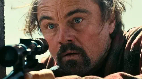 assets/leonardo-dicaprio-holding-rife-in-one-battler-after-another.jpeg