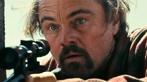 assets/leonardo-dicaprio-holding-rife-in-one-battler-after-another.jpeg