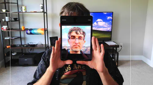 assets/Chris-Hoffman-face-photo-on-iPad-trying-to-fool-Windows-Hello-facial-scan.jpeg