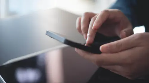 assets/phone-in-hands-GettyImages1687958513.jpeg