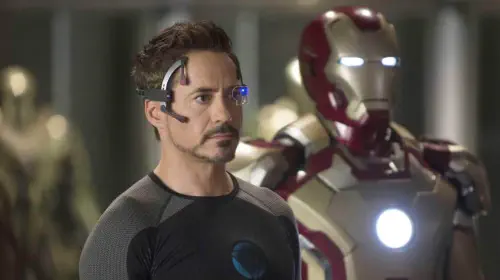 assets/robert-downey-jr-as-tony-stark-working-on-different-iron-man-suits-in-his-garage-in-iron-man-3-1.jpeg