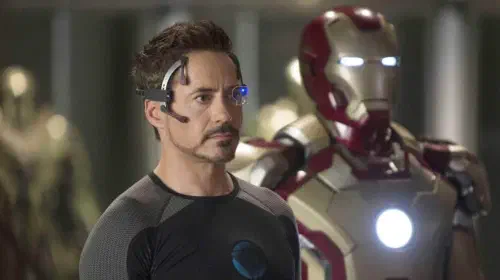 assets/robert-downey-jr-as-tony-stark-working-on-different-iron-man-suits-in-his-garage-in-iron-man-3-1.jpeg