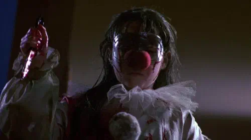 assets/danielle-harris-holds-a-knife-in-halloween-4.jpeg