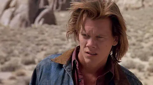 assets/kevin-bacon-in-the-film-tremors.jpeg