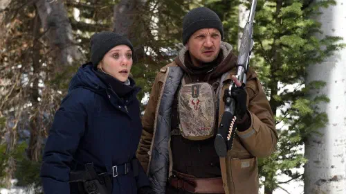 assets/jeremy-renner-as-agent-cory-lambert-and-elizabeth-olsen-as-agent-jane-banner-in-wind-river.jpeg