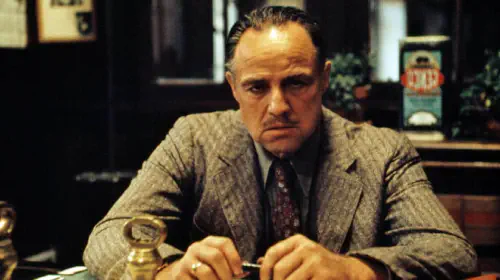 assets/marlon-brando-as-don-corleone-looking-intense-in-the-godfather.jpeg