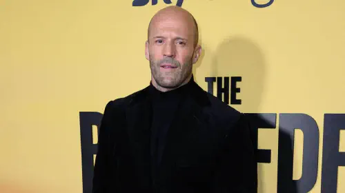 assets/jason-statham-is-posing-while-at-the-beekeeper-red-carpet.jpeg