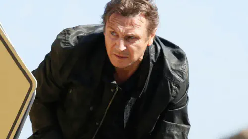 assets/liam-neeson-crouching-behind-a-sign-in-taken-3.jpeg