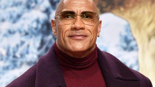 assets/dwayne-johnson-posing-on-a-red-carpet-for-red-one.jpeg