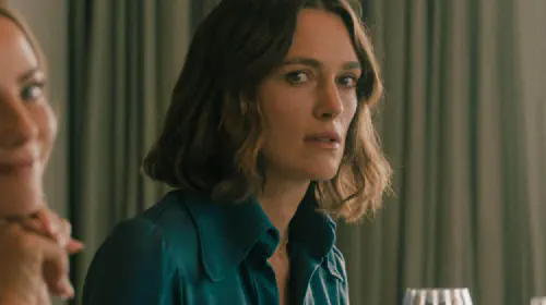 assets/keira-knightley-looking-perturbed-at-a-dinner-party-in-the-woman-in-cabin-10.jpeg