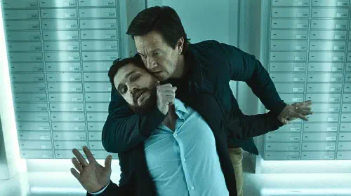 assets/mark-wahlberg-and-kit-harington-in-the-family-plan-2.jpeg
