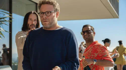 assets/keanu-reeves-gabriel-reaching-out-to-seth-rogen-s-jeff-at-a-party-in-aziz-ansari-s-good-fortune.jpeg