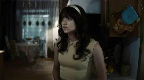 assets/the-black-phone-2-star-madeleine-mcgraw-looking-scared-in-the-curse-of-the-necklace.jpeg