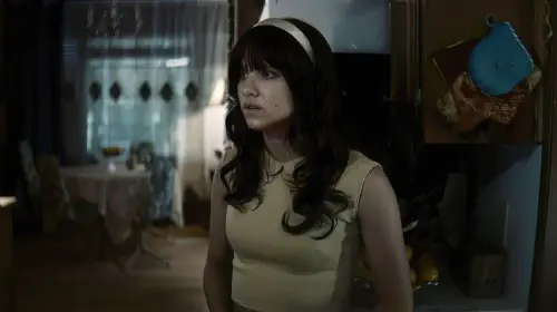 assets/the-black-phone-2-star-madeleine-mcgraw-looking-scared-in-the-curse-of-the-necklace.jpeg