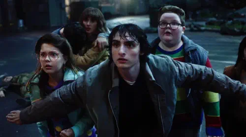 assets/finn-wolfhard-as-mike-wheeler-protecting-kids-in-stranger-things-season-5.jpeg