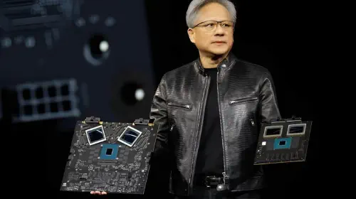 assets/nvidia-ceo-jensen-huang-showcases-GB200-grace-blackwell-superchips-624x416-1.jpeg