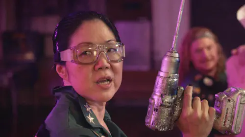 assets/margaret-cho-holding-a-bedazzled-drill-in-queens-of-the-dead.jpeg