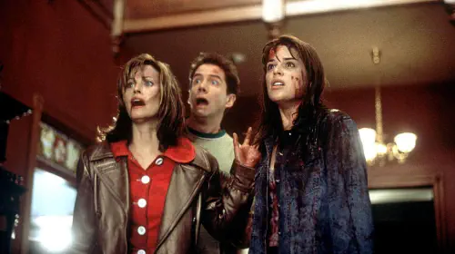 assets/courteney-cox-jamie-kennedy-neve-campbell-as-gale-randy-and-sidney-in-scream.jpeg
