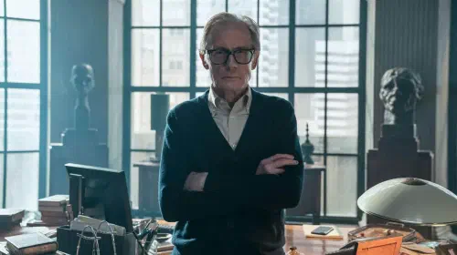 assets/billy-nigy-as-doctor-lazarus-with-his-arms-folded-in-lazarus.jpeg