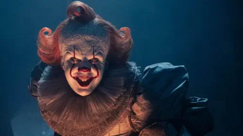 assets/bill-skarsgard-sneering-as-pennywise-in-it-welcome-to-derry.jpeg