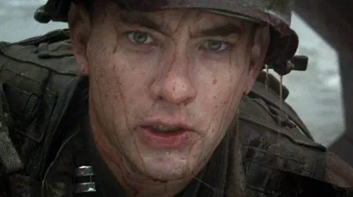 assets/tom-hanks-has-bloody-water-coming-down-his-face-in-saving-private-ryan.jpeg