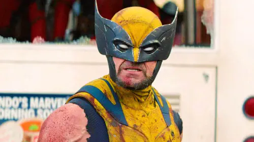 assets/hugh-jackman-as-wolverine-in-full-suit-and-helmet-growling-in-deadpool-wolverine.jpeg