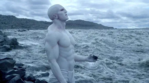 assets/an-engineer-standing-by-water-in-prometheus.jpeg