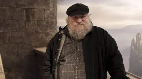 assets/george-r-r-martin-on-the-set-of-game-of-thrones.jpeg