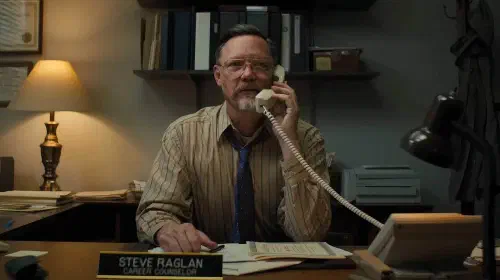 assets/matthew-lillard-plays-steve-and-is-shown-speaking-on-the-phone-in-the-movie-five-nights-at-freddy-s.jpeg